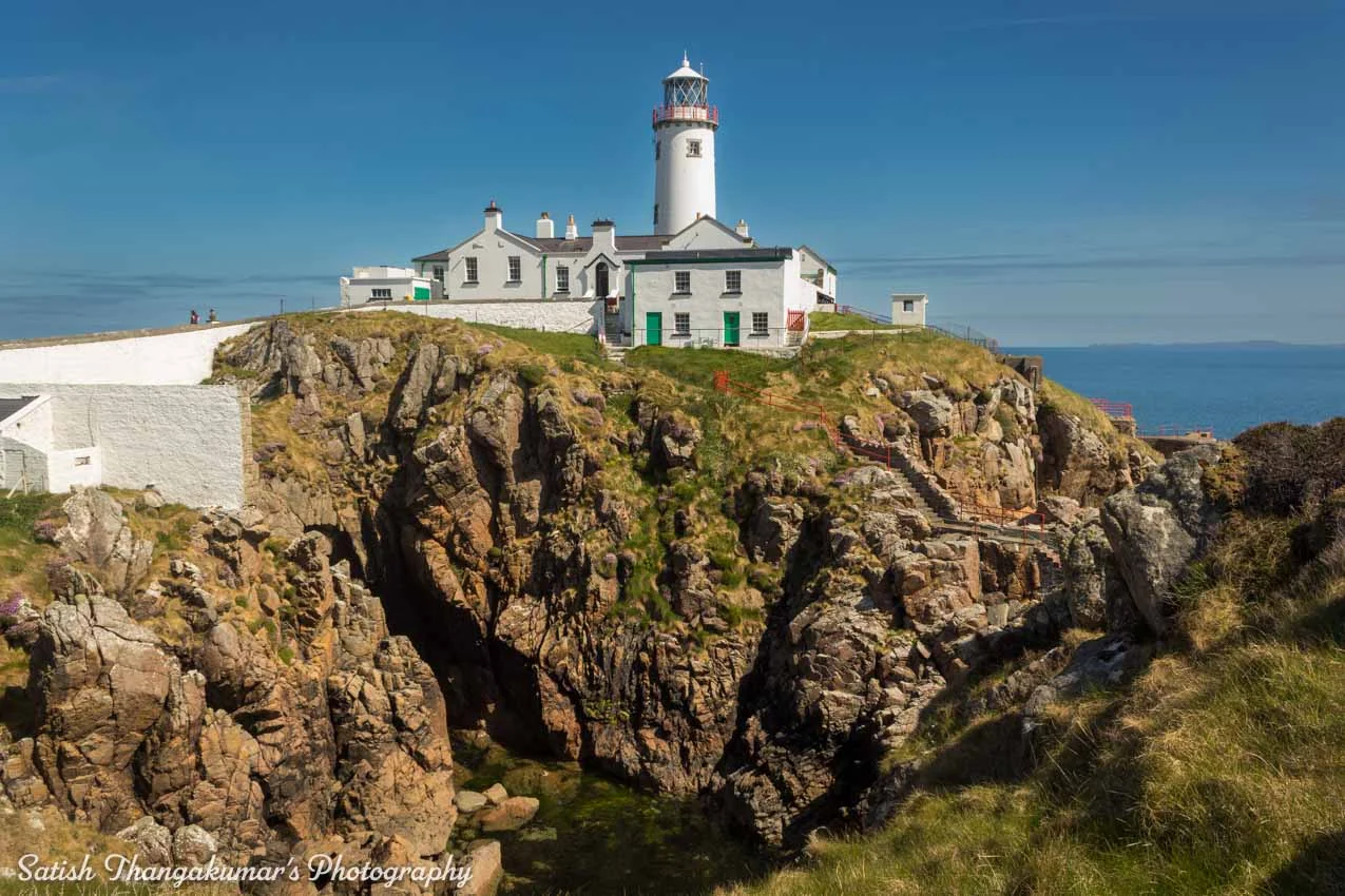 Fanad Lighthouse with rolling hills in the background